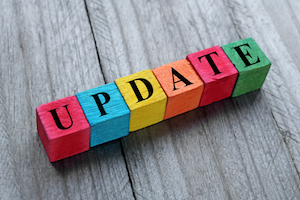 Colorful wooden blocks form the word Update.