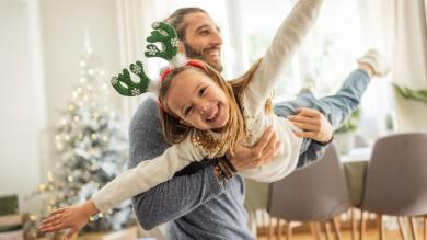 
		Young father with daughter at Christmas
	