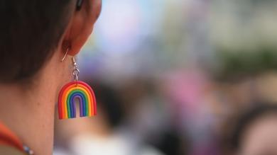 
		Young man with rainbow earring
	