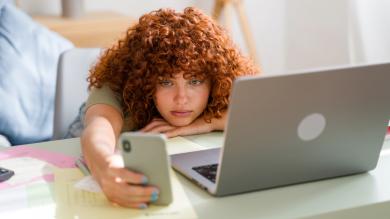 
		tired young woman in front of laptop
	