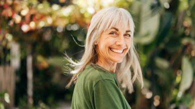 
		Cheerful middle-aged woman
	