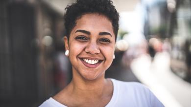 
		short-haired woman smiles
	