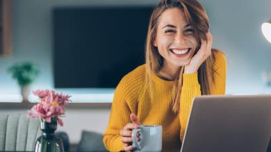 
		A woman writes something in a notebook for better time management
	