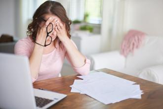 
		Woman with hands in front of face
	