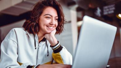 
		Young woman, sitting at her laptop
	