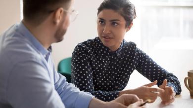
		Counseling interview with young woman and young man
	