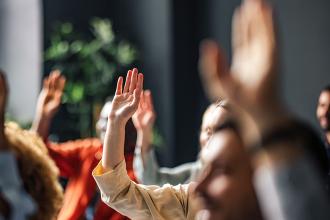 
		People raise their hands
	