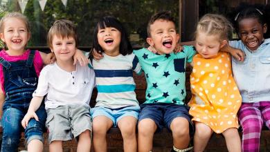 
		Children laughing in a row
	