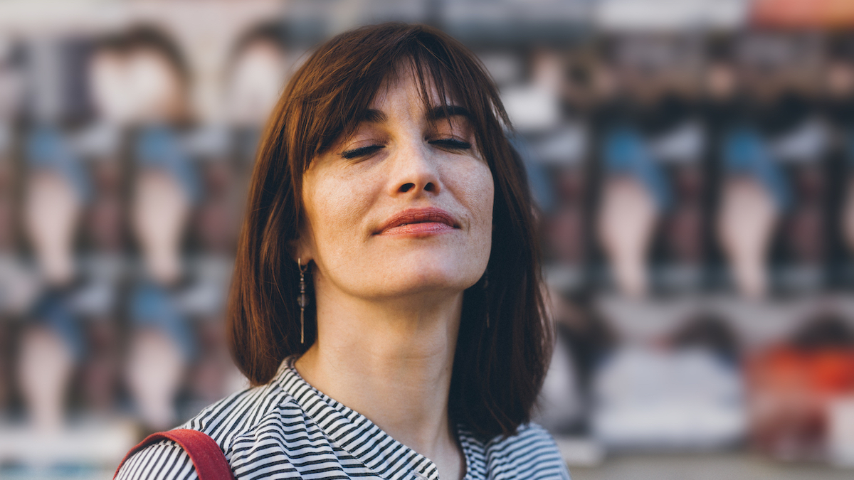 Businesswoman closes her eyes