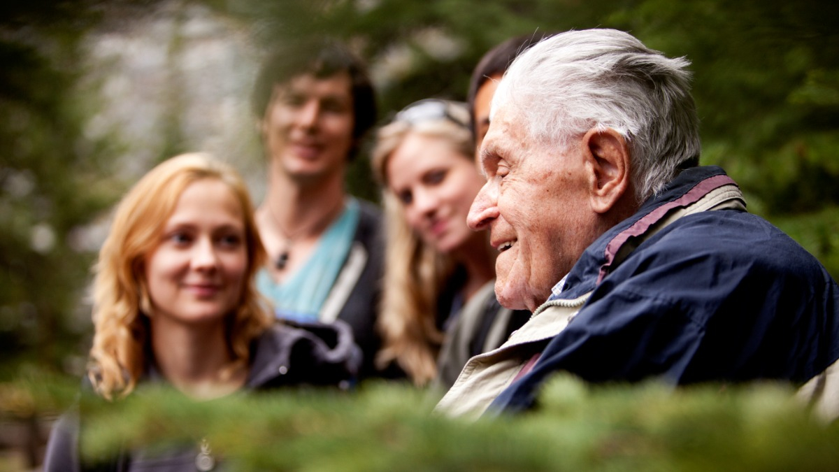 Old man with young people