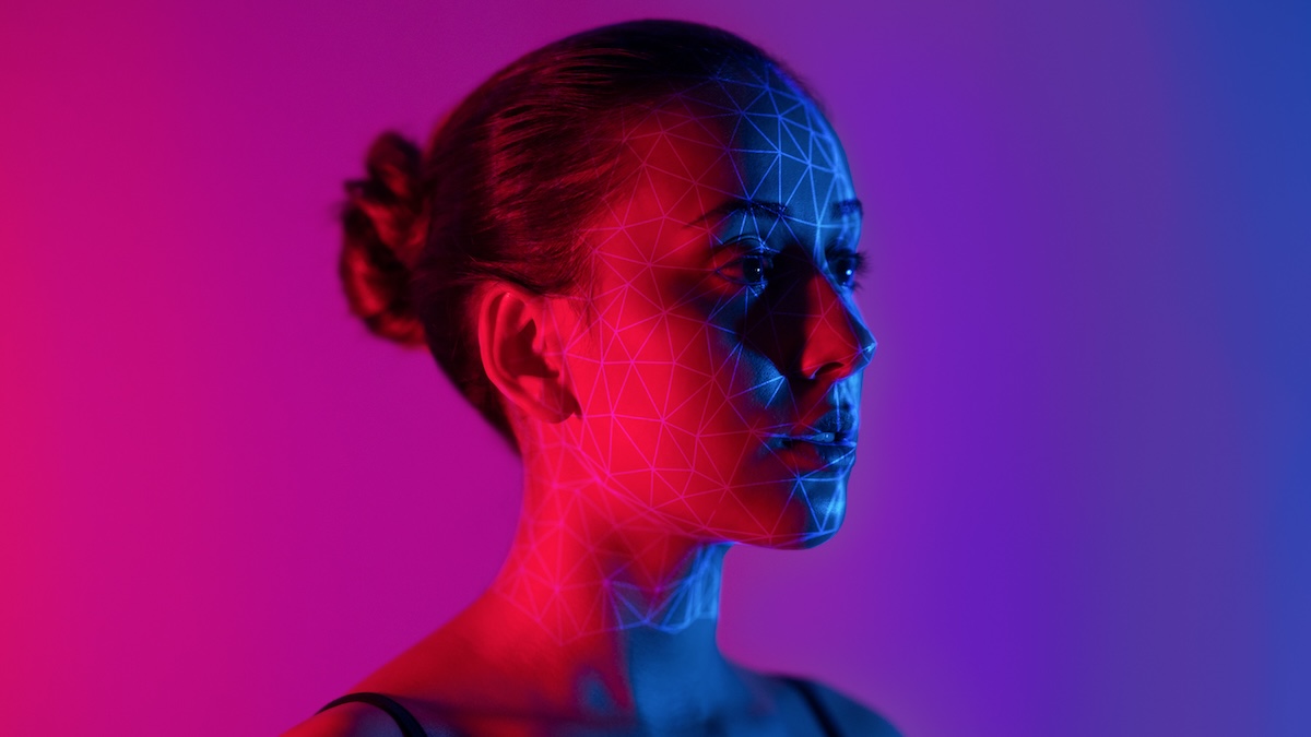 Young woman has patterns of AI technology on her face