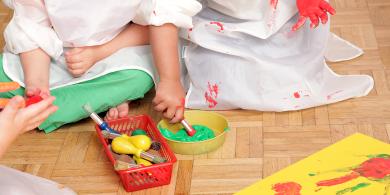 Children play with watercolors